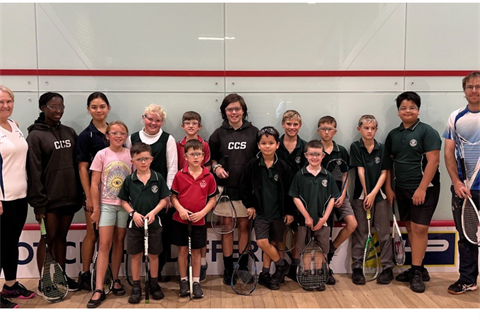 Junior members of Coleambally Squash Club with Treasurer Cate Hardy and President Neil Burke