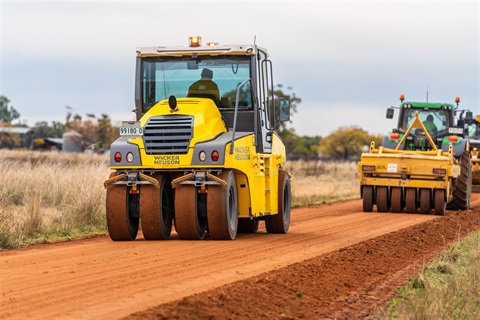 Council rollers on dirt road